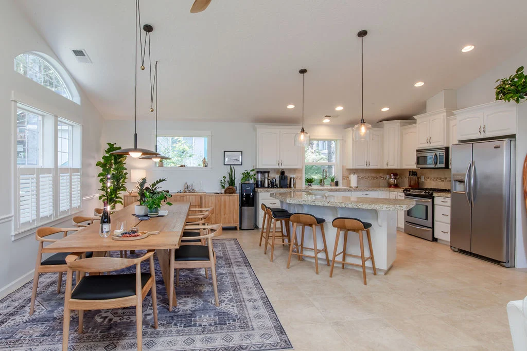 Haystack Hideaway - Kitchen and dining space Vacation Rental in Cannon Beach, Anchor's Retreat kitchen with oven, dishwasher and sink
